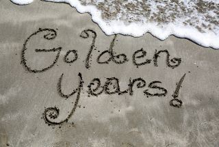 Golden Years written in sand