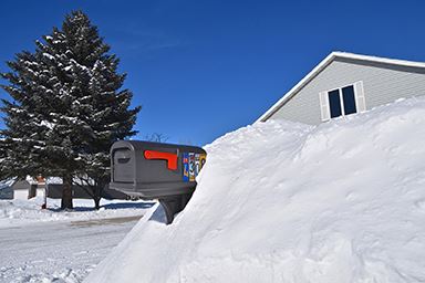 mailbox buried in snow